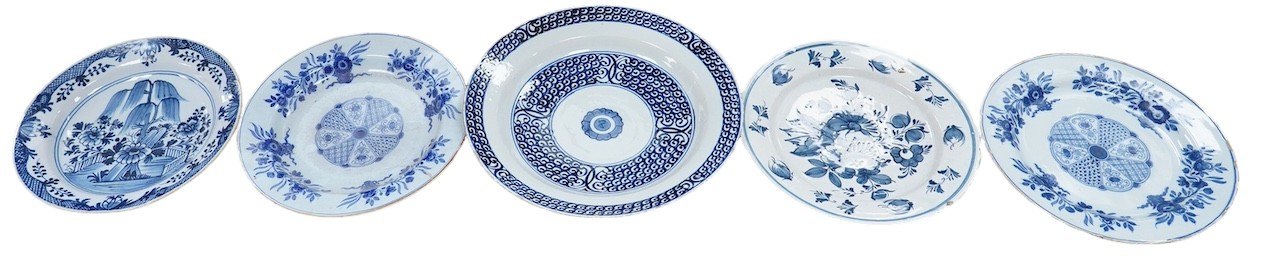 Five various delft dishes, largest 37cm diameter. Condition - poor to fair